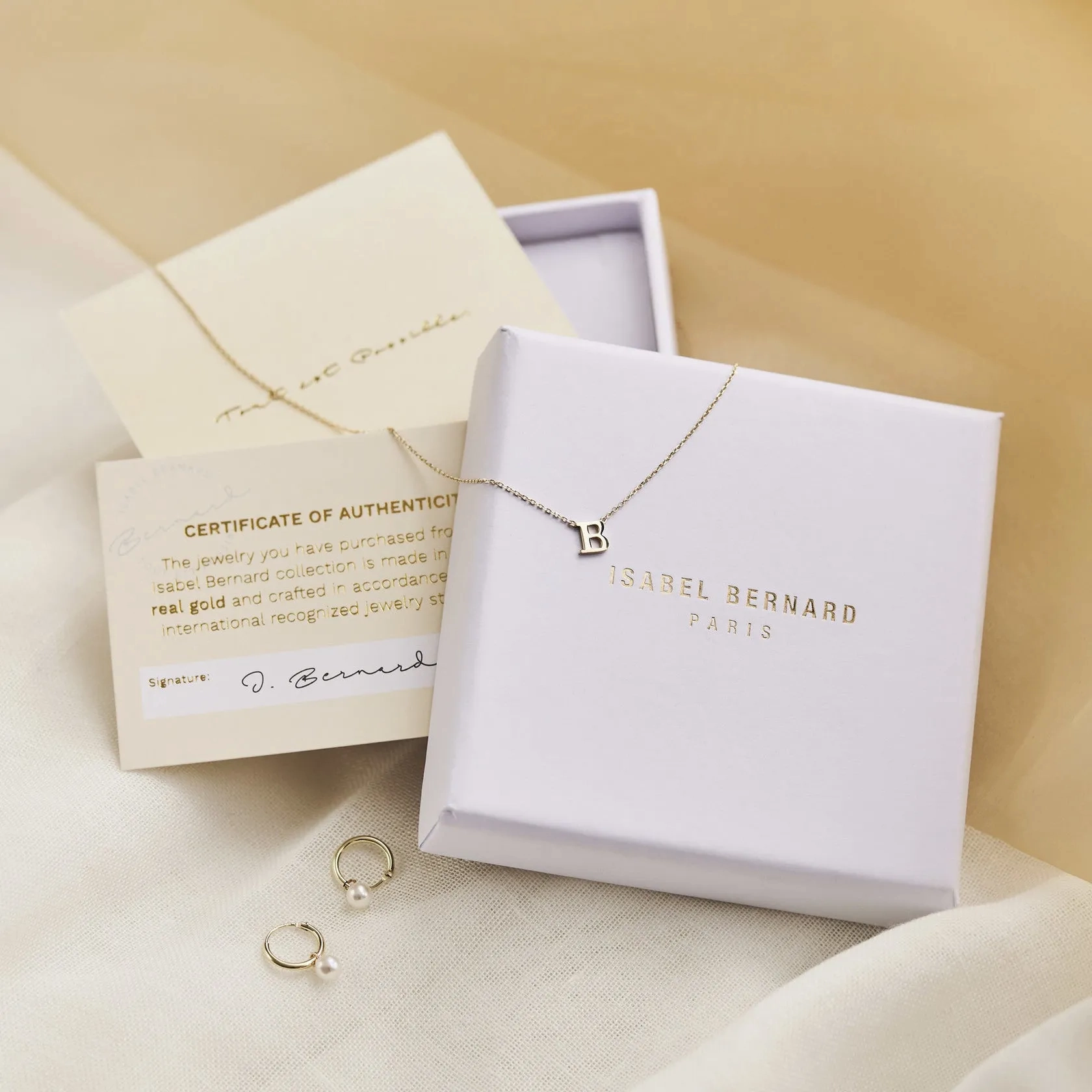 Cadeau d'Isabel 14 karat gold necklace &amp; bracelet gift set with rings