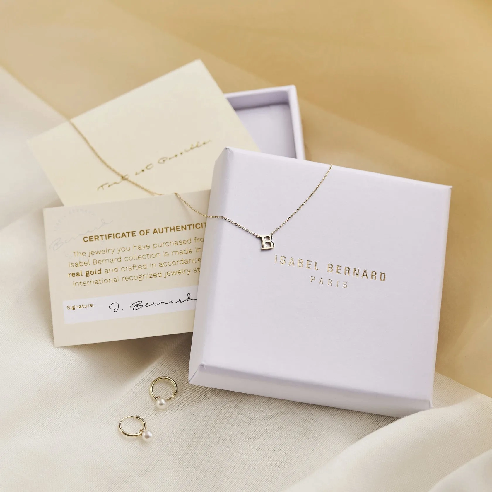 Cadeau d'Isabel 14 karat gold necklace and bracelet gift set with rods
