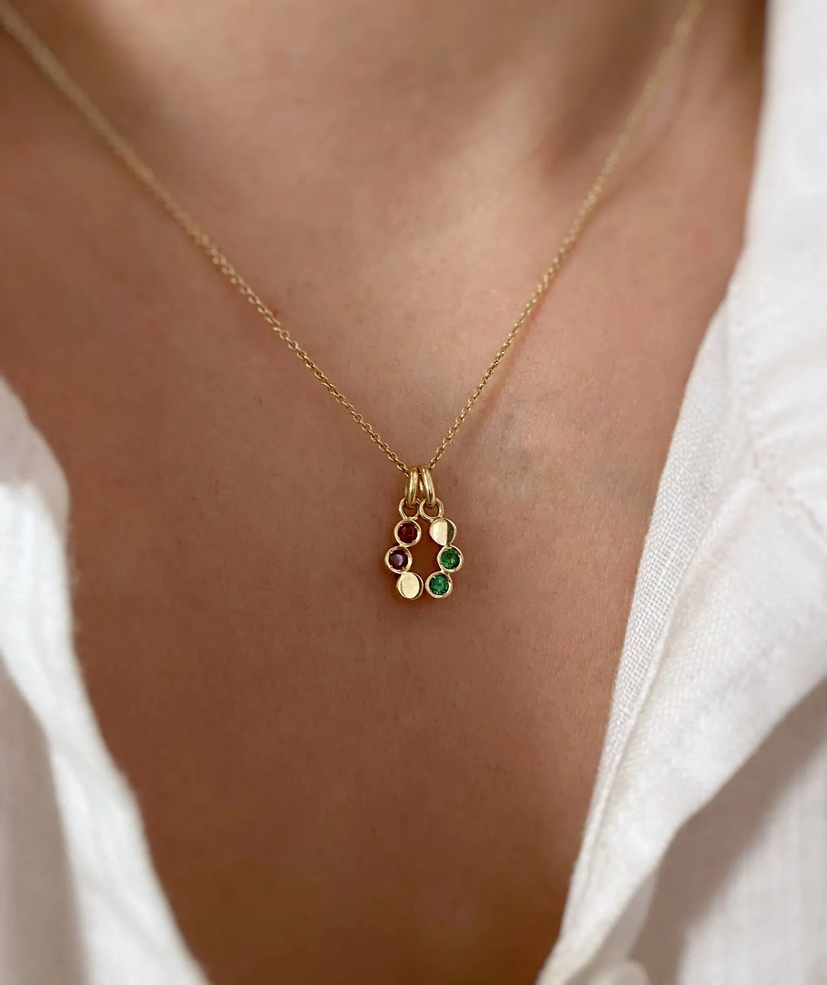 Coralie Grzes | Sofia Amulet of January 18K Gold Necklace w. Garnets