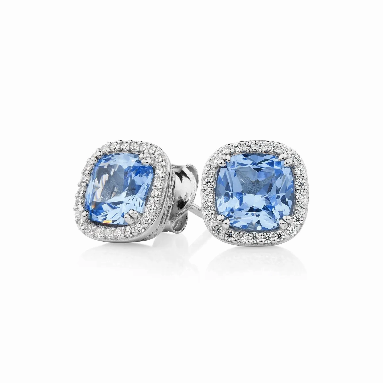 Cushion and Round Brilliant halo stud earrings with blue topaz simulants and 2.81 carats* of diamond simulants in sterling silver