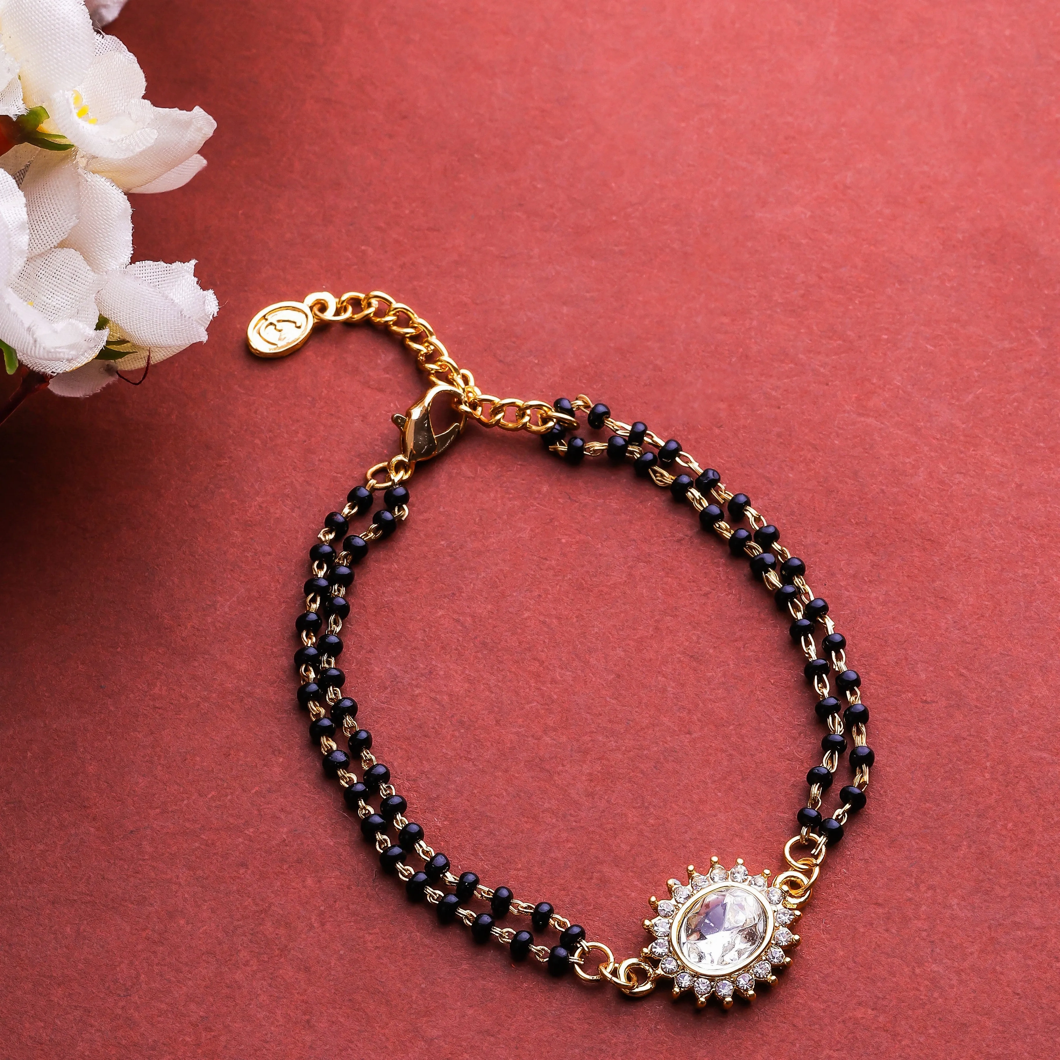 Estele Gold Plated Evil Eye with Black Beads Bracelet with Austrian Crystals &amp; Kundan for Women