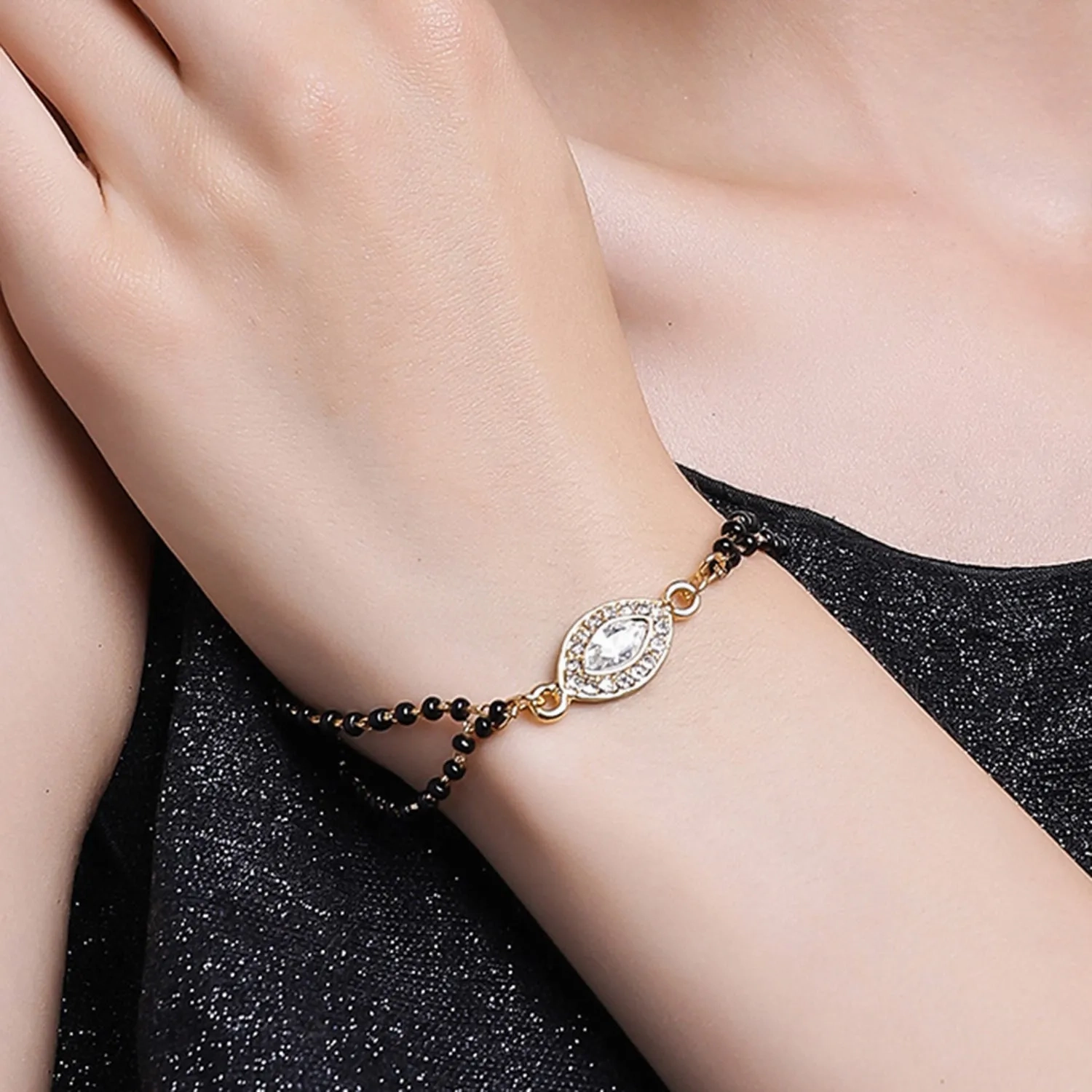 Estele Gold Plated Evil Eye with Black Beads Bracelet with Austrian Crystals &amp; Kundan for Women