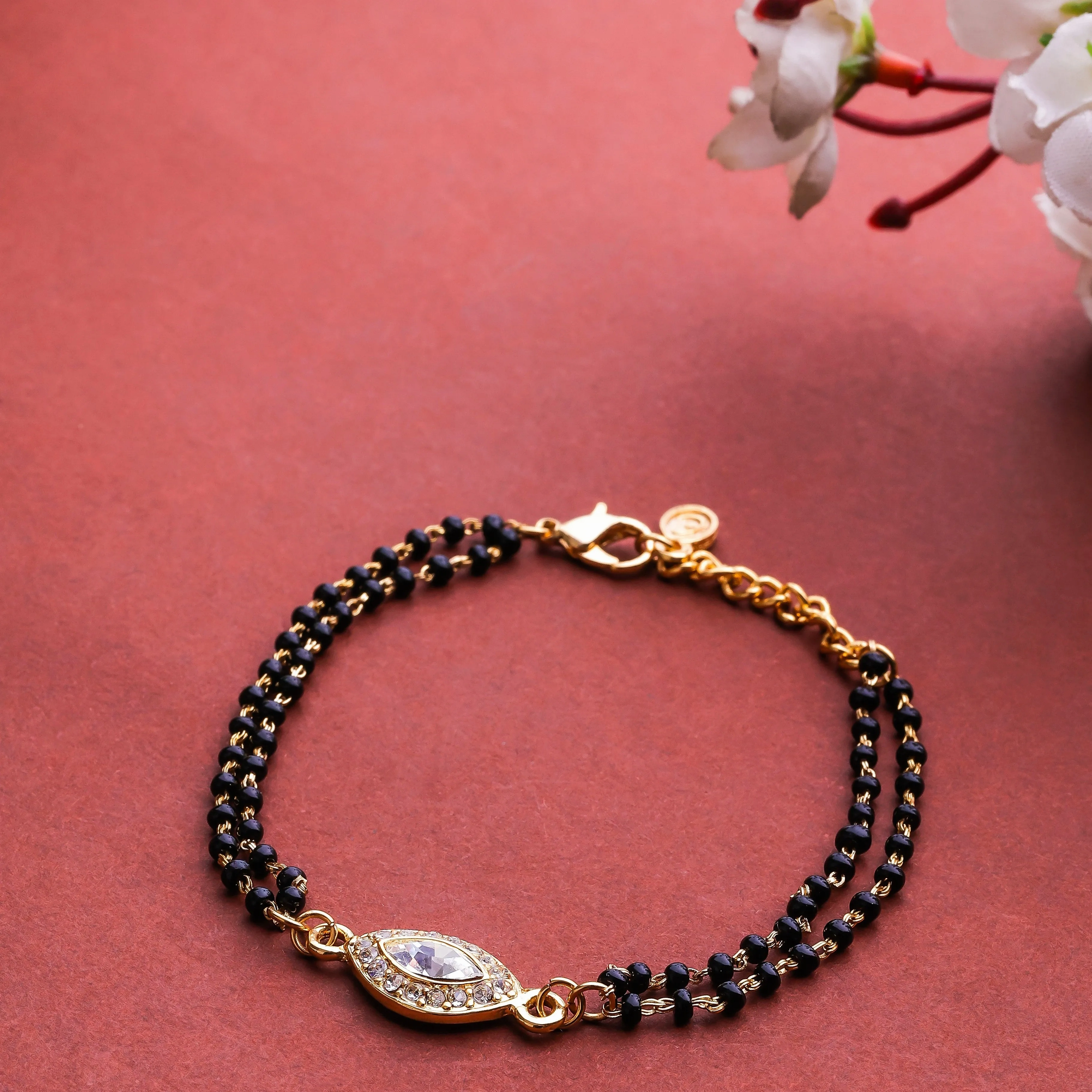 Estele Gold Plated Evil Eye with Black Beads Bracelet with Austrian Crystals &amp; Kundan for Women