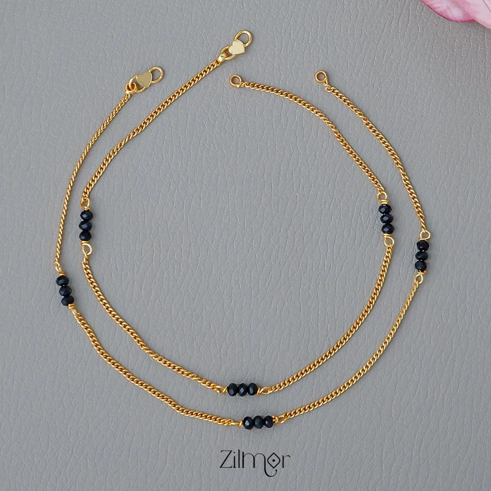 KT1011131 - Gold Toned Black bead pair Anklet
