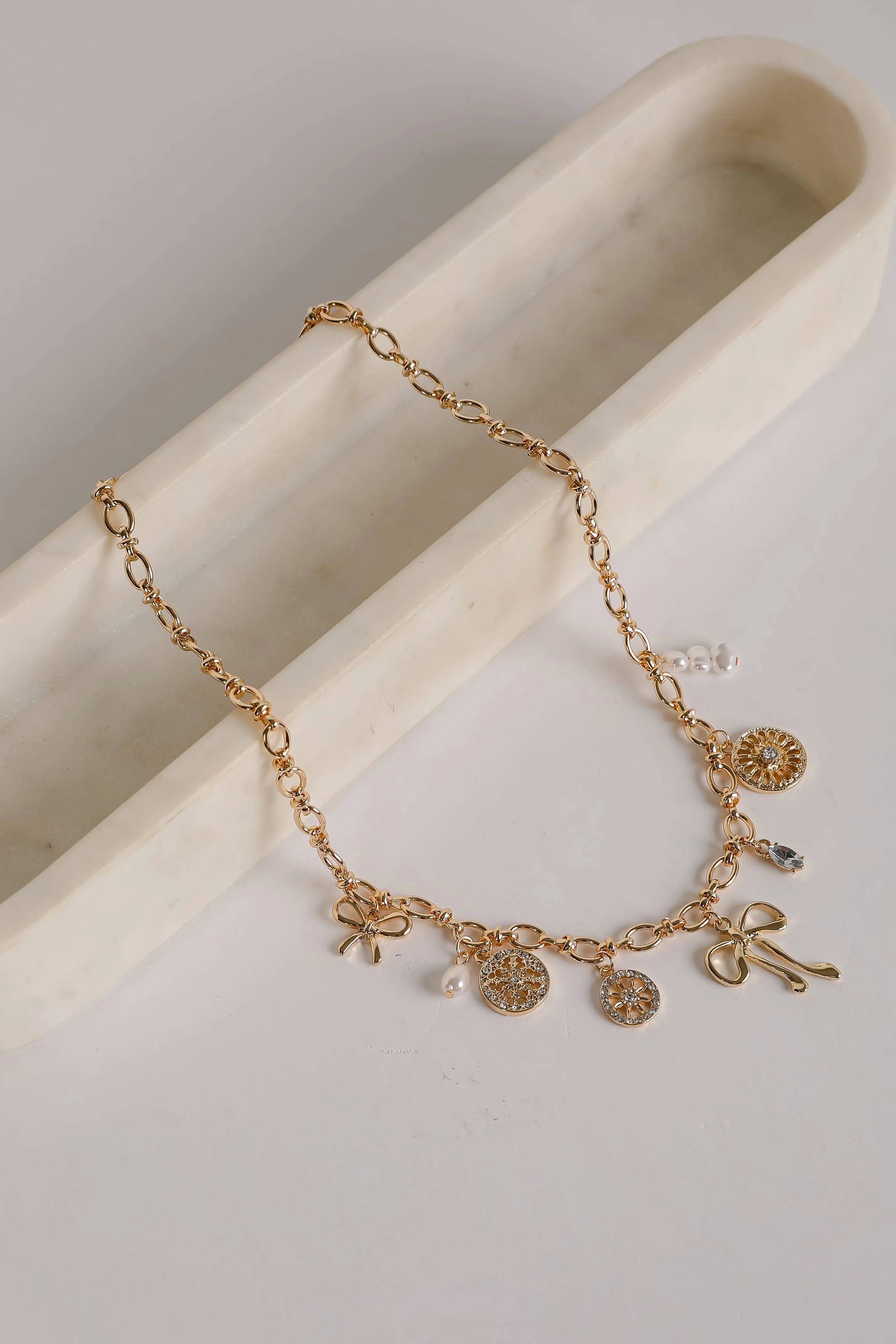 Meredith Gold Bow Charm Necklace