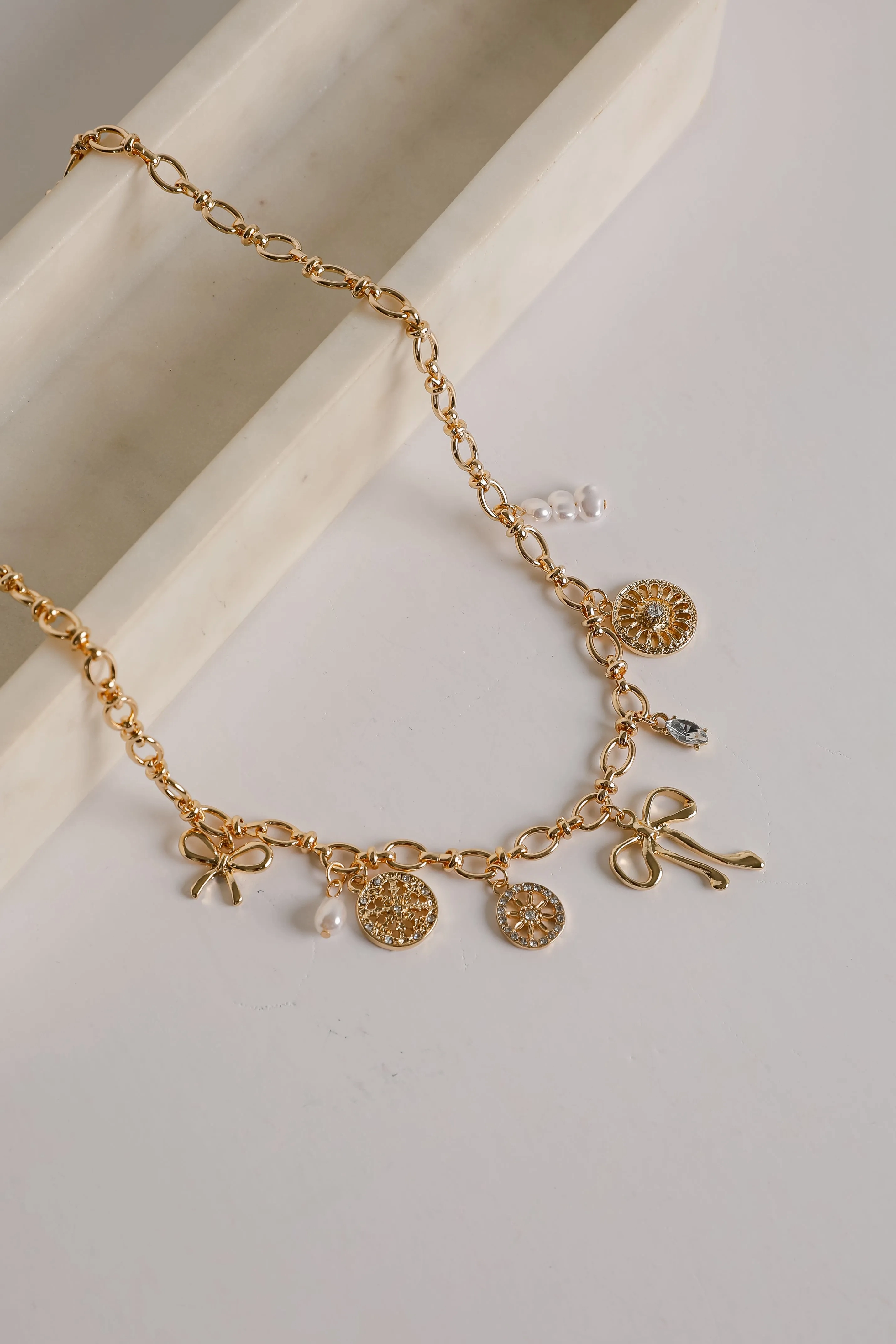 Meredith Gold Bow Charm Necklace