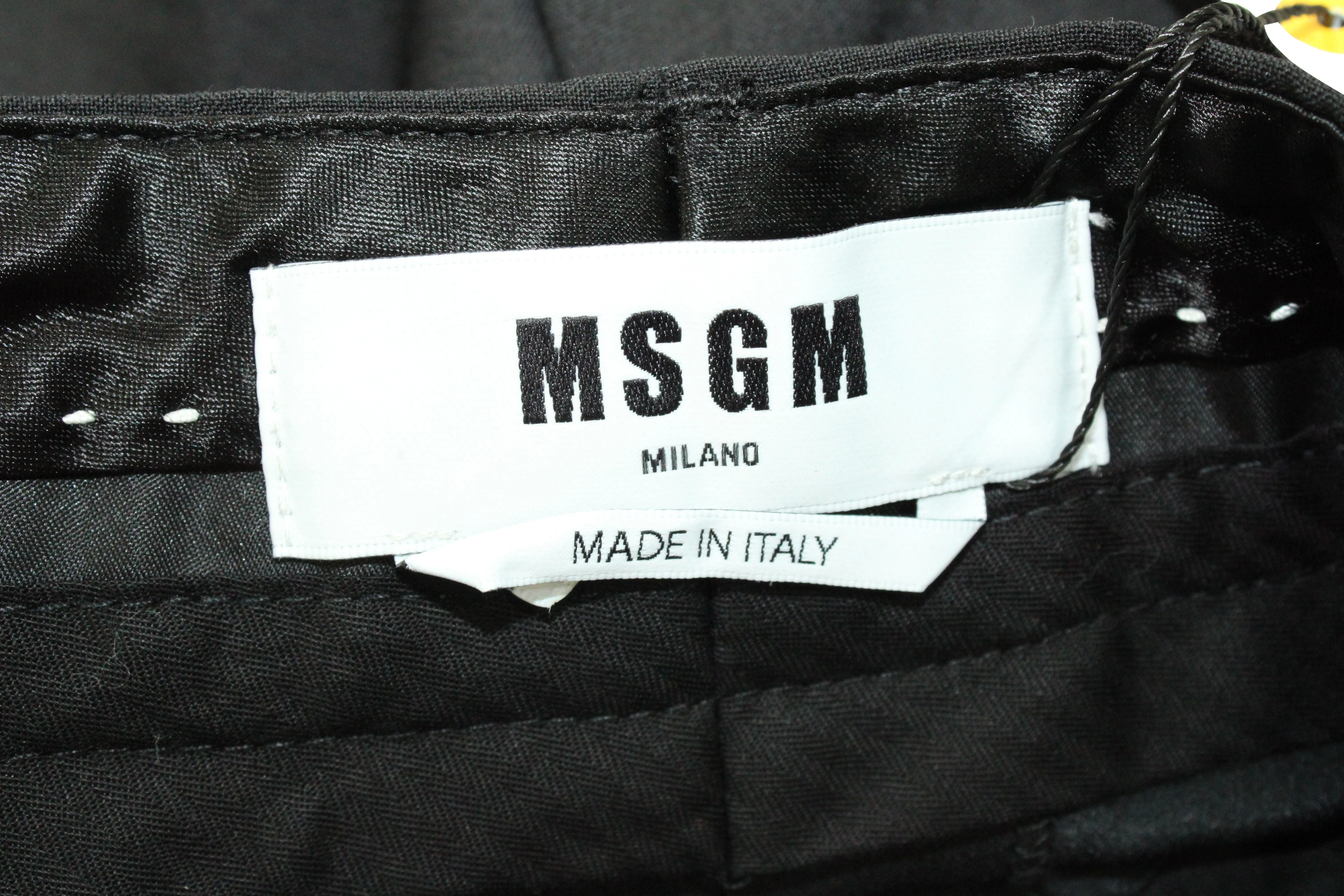 MSGM Weit geschnittene, taillierte Hose in Schwarz aus Polyester