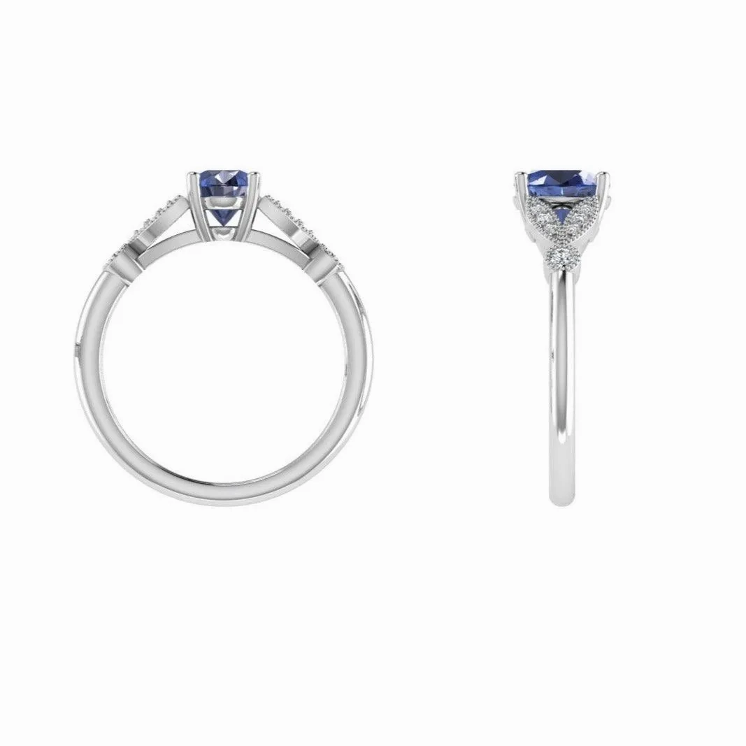 Oval Blue Topaz and Diamond Leaf Ring