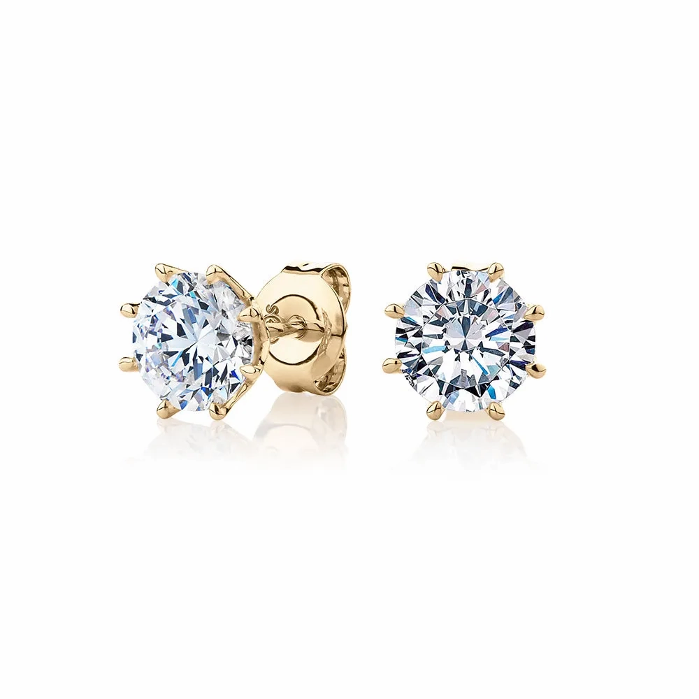 Round Brilliant stud earrings with 2 carats* of diamond simulants in 10 carat yellow gold