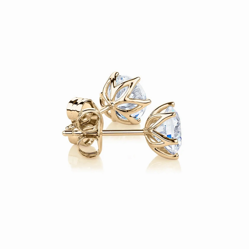 Round Brilliant stud earrings with 2 carats* of diamond simulants in 10 carat yellow gold