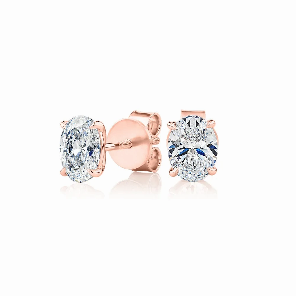 Signature Simulant Diamond 1.40 carat* TW oval stud earrings in 14 carat rose gold