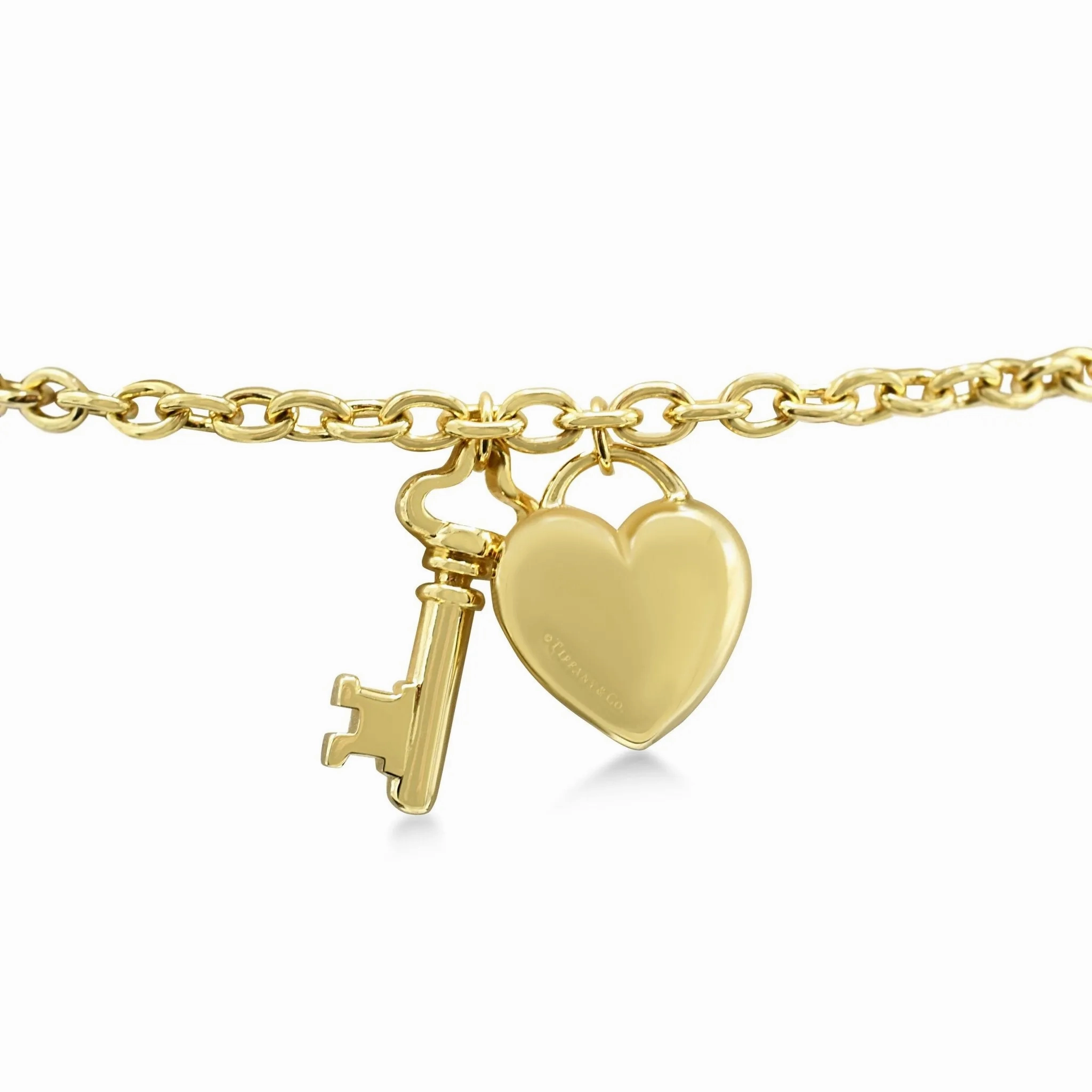 Tiffany Heart &amp; Padlock 6.5&quot; Bracelet - 18ct Yellow Gold